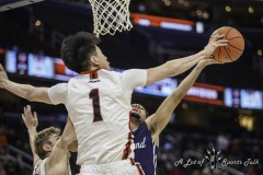 Washington, DC - March 13, 2022: Davidson Wildcats guard Hyunjung Lee (1) blocks Richmond Spiders guard Jacob Gilyard (0) shot during the Atlantic 10 championship game between Richmond and VCU at  Capital One Arena in Washington, DC.   (Photo by Elliott Brown/A Lot of Sports Talk)