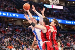 Washington, DC - March 14, 2024: Duke Blue Devils center Kyle Filipowski (30) attempts a shot during the quarterfinal round of the 2024 ACC Tournament between Duke and NC State at Capital One Arena in Washington, DC.  (Photo by Elliott Brown/A Lot of Sports Talk)