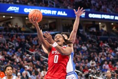 Washington, DC - March 14, 2024: North Carolina State Wolfpack guard DJ Horne (0) makes a layup during the quarterfinal round of the 2024 ACC Tournament between Duke and NC State at Capital One Arena in Washington, DC.  (Photo by Elliott Brown/A Lot of Sports Talk)