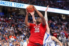 Washington, DC - March 14, 2024: North Carolina State Wolfpack forward DJ Burns Jr. (30) attempts a shot during the quarterfinal round of the 2024 ACC Tournament between Duke and NC State at Capital One Arena in Washington, DC.  (Photo by Elliott Brown/A Lot of Sports Talk)