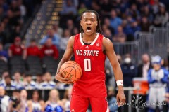 Washington, DC - March 14, 2024: North Carolina State Wolfpack guard DJ Horne (0) calls a play during the quarterfinal round of the 2024 ACC Tournament between Duke and NC State at Capital One Arena in Washington, DC.  (Photo by Elliott Brown/A Lot of Sports Talk)
