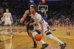 MANHATTAN, NEW YORK — March 14:   UConn guard STEPHON CASTLE (5) drives the baseline during the first half of the Big East Tournament Quarterfinal game against Xavier at Madison Square Garden on March 14, 2024, in Manhattan, N.Y. (Scotty Rausenberger/A Lot of Sports Talk)
