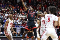 March 14, 2024: San Diego State Aztecs guard Darrion Trammell (12) drives to the the basket during the first half of the Men’s Quarterfinals of the Mountain West Conference tournament, Thursday, March 14, 2024, in Las Vegas, NV. Christopher Trim/A Lot of Sports Talk.