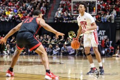 March 14, 2024: UNLV Rebels guard Dedan Thomas Jr. (11) looks to pass the ball during the second half of the Men’s Quarterfinals of the Mountain West Conference tournament, Thursday, March 14, 2024, in Las Vegas, NV. Christopher Trim/A Lot of Sports Talk.