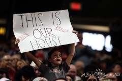 March 14, 2024: A young UNLV Rebels fan holds up a sign show support during the second half of the Men’s Quarterfinals of the Mountain West Conference tournament, Thursday, March 14, 2024, in Las Vegas, NV. Christopher Trim/A Lot of Sports Talk.
