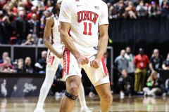 March 14, 2024: UNLV Rebels guard Dedan Thomas Jr. (11) celebrates after scoring in the final seconds of regulation during the second half of the Men’s Quarterfinals of the Mountain West Conference tournament, Thursday, March 14, 2024, in Las Vegas, NV. Christopher Trim/A Lot of Sports Talk.