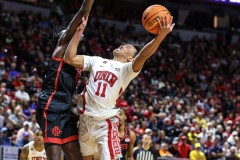 March 14, 2024: UNLV Rebels guard Dedan Thomas Jr. (11) drives to the basket during the second half of the Men’s Quarterfinals of the Mountain West Conference tournament, Thursday, March 14, 2024, in Las Vegas, NV. Christopher Trim/A Lot of Sports Talk.