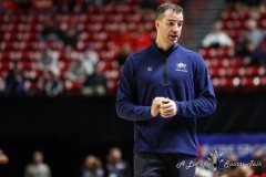 March 14, 2024: Utah State Aggies head coach Danny Sprinkle on the court during the first half of the Men’s Quarterfinals of the Mountain West Conference tournament, Thursday, March 14, 2024, in Las Vegas, NV. Christopher Trim/A Lot of Sports Talk.