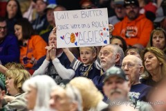March 14, 2024: A young Utah State Aggies fan holds up a sign supporting her team during the first half of the Men’s Quarterfinals of the Mountain West Conference tournament, Thursday, March 14, 2024, in Las Vegas, NV. Christopher Trim/A Lot of Sports Talk.