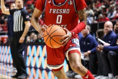 March 14, 2024: Fresno State Bulldogs guard Donavan Yap Jr. (0) drives the baseline during the first half of the Men’s Quarterfinals of the Mountain West Conference tournament, Thursday, March 14, 2024, in Las Vegas, NV. Christopher Trim/A Lot of Sports Talk.