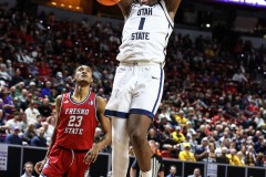 March 14, 2024: Utah State Aggies forward Great Osobor (1) dunks the ball during the second half of the Men’s Quarterfinals of the Mountain West Conference tournament, Thursday, March 14, 2024, in Las Vegas, NV. Christopher Trim/A Lot of Sports Talk.