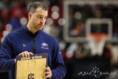 March 14, 2024: Utah State Aggies head coach Danny Sprinkle on the court during the second half of the Men’s Quarterfinals of the Mountain West Conference tournament, Thursday, March 14, 2024, in Las Vegas, NV. Christopher Trim/A Lot of Sports Talk.