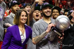 March 16, 2024: Gloria Nevarez, Mountain West Commissioner, presents the MVP trophy to New Mexico Lobos guard Jaelen House (10) at the conclusion of the Men’s Mountain West Conference tournament, Saturday, March 16, 2024, in Las Vegas, NV. Christopher Trim/A Lot of Sports Talk.