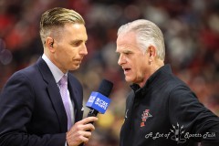 March 16, 2024: San Diego State Aztecs head coach Brian Dutcher speaks with CBS reporter Evan Washburn during the first half of the Men’s Finals of the Mountain West Conference tournament, Saturday, March 16, 2024, in Las Vegas, NV. Christopher Trim/A Lot of Sports Talk.