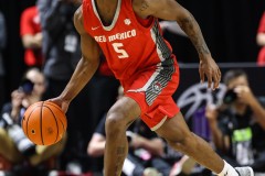 March 16, 2024: New Mexico Lobos guard Jamal Mashburn Jr. (5) brings the ball up the court during the first half of the Men’s Finals of the Mountain West Conference tournament, Saturday, March 16, 2024, in Las Vegas, NV. Christopher Trim/A Lot of Sports Talk.