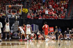 March 16, 2024: New Mexico Lobos fans try to distract San Diego State Aztecs forward Jay Pal (4) free throw during the first half of the Men’s Finals of the Mountain West Conference tournament, Saturday, March 16, 2024, in Las Vegas, NV. Christopher Trim/A Lot of Sports Talk.