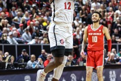 March 16, 2024: San Diego State Aztecs guard Darrion Trammell (12) grabs a rebound during the first half of the Men’s Finals of the Mountain West Conference tournament, Saturday, March 16, 2024, in Las Vegas, NV. Christopher Trim/A Lot of Sports Talk.