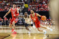 March 16, 2024: New Mexico Lobos guard Jaelen House (10) drives past San Diego State Aztecs guard Darrion Trammell (12) during the first half of the Men’s Finals of the Mountain West Conference tournament, Saturday, March 16, 2024, in Las Vegas, NV. Christopher Trim/A Lot of Sports Talk.