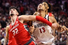 March 16, 2024: San Diego State Aztecs forward Jaedon LeDee (13) and New Mexico Lobos forward Mustapha Amzil (22) position themselves for a rebound during the second half of the Men’s Finals of the Mountain West Conference tournament, Saturday, March 16, 2024, in Las Vegas, NV. Christopher Trim/A Lot of Sports Talk.