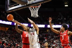 March 16, 2024: San Diego State Aztecs forward Jaedon LeDee (13) is fouled by New Mexico Lobos center Nelly Junior Joseph (23) during the second half of the Men’s Finals of the Mountain West Conference tournament, Saturday, March 16, 2024, in Las Vegas, NV. Christopher Trim/A Lot of Sports Talk.