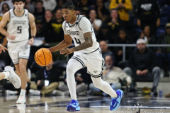 March 09, 2025: Washington DC: Towson Tigers guard Dylan Williamson (4) dribbles the ball up court during the Coastal Athletic Association Basketball Championship at CareFirst Arena in Washington, DC. (Michael R. Smith/A Lot of Sports Talk).
