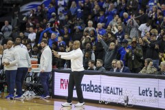 During the Big East Conference game between Seton Hall and Marquette, Seton Hall head coach SHAHEEN HOLLOWAY calms his team down late in the second half of the game at the Prudential Center in Newark, New Jersey