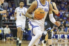 During the Big East Conference game between Seton Hall and Marquette, Seton Hall guard ISAIAH COLEMAN (21) drives on a fast break that resulted in a foul during the first half of the game at the Prudential Center in Newark, New Jersey