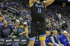 During the Big East Conference game between Seton Hall and Marquette, Marquette guard TYLER KOLEK (11) takes a three-point shot during the second half of the game  at the Prudential Center in Newark, New Jersey
