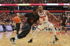 During the ACC conference basketball game between Syracuse University and Miami University, Syracuse guard J.J. STARLING (2) defends Miami guard BENSLEY JOSEPH (4) as he drives the baseline during the second half of the game held at the JMA Wireless Dome on the campus of Syracuse University.