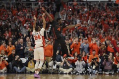 During the ACC conference basketball game between Syracuse University and Miami University, Syracuse guard QUADIR COPELAND (24) takes the game-winning three-point shot to beat the buzzer late in the second half of the game held at the JMA Wireless Dome on the campus of Syracuse University.
