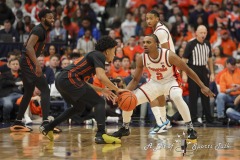 During the ACC conference basketball game between Syracuse University and Miami University, Syracuse guard J.J. STARLING (2) defends Miami guard NIJEL PACK (24) during the second half of the game held at the JMA Wireless Dome on the campus of Syracuse University.