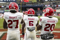 During the 13th annual  BAD BOY MOWERS PINSTRIPE BOWL  between Big Ten conference Rutgers University and ACC University of Miami, Rutgers running back trio of SAMUEL BROWN V (27), KYLE MONANGAI (5) AND JÁSHON BENJAMIN (20) wait in their end zone during pre-game warmups at Yankee Stadium in The Bronx.