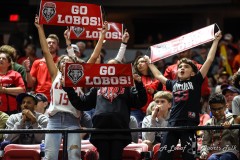 March 15, 2024: New Mexico Lobos fans hold up signs showing support prior to the start of the Men’s Semifinals of the Mountain West Conference tournament, Friday, March 15, 2024, in Las Vegas, NV. Christopher Trim/A Lot of Sports Talk.