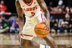 March 15, 2024: New Mexico Lobos guard Jamal Mashburn Jr. (5) dribbles the ball during the first half of the Men’s Semifinals of the Mountain West Conference tournament, Friday, March 15, 2024, in Las Vegas, NV. Christopher Trim/A Lot of Sports Talk.