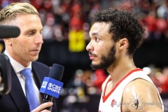 March 15, 2024: CBS reporter Evan Washburn speaks with New Mexico Lobos guard Jaelen House (10) at the conclusion of the Men’s Semifinals of the Mountain West Conference tournament, Friday, March 15, 2024, in Las Vegas, NV. Christopher Trim/A Lot of Sports Talk.