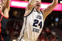 March 15, 2024: Utah State Aggies forward Karson Templin (24) grabs a rebound during the first half of the Men’s Semifinals of the Mountain West Conference tournament, Friday, March 15, 2024, in Las Vegas, NV. Christopher Trim/A Lot of Sports Talk.