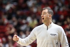 March 15, 2024: Utah State Aggies head coach Danny Sprinkle yells to his team during the first half of the Men’s Semifinals of the Mountain West Conference tournament, Friday, March 15, 2024, in Las Vegas, NV. Christopher Trim/A Lot of Sports Talk.