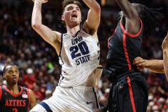 March 15, 2024: Utah State Aggies center Isaac Johnson (20) shoots the ball during the second half of the Men’s Semifinals of the Mountain West Conference tournament, Friday, March 15, 2024, in Las Vegas, NV. Christopher Trim/A Lot of Sports Talk.