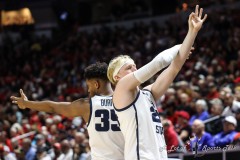 March 15, 2024: Utah State Aggies forward Nigel Burris (35) and Utah State Aggies forward Karson Templin (24) celebrate a made three point shot during the second half of the Men’s Semifinals of the Mountain West Conference tournament, Friday, March 15, 2024, in Las Vegas, NV. Christopher Trim/A Lot of Sports Talk.