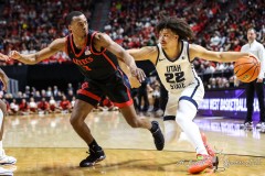March 15, 2024: Utah State Aggies guard Javon Jackson (22) drive to the baseline during the second half of the Men’s Semifinals of the Mountain West Conference tournament, Friday, March 15, 2024, in Las Vegas, NV. Christopher Trim/A Lot of Sports Talk.