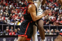 March 15, 2024: Utah State Aggies forward Great Osobor (1) is fouled by San Diego State Aztecs forward Jaedon LeDee (13) during the second half of the Men’s Semifinals of the Mountain West Conference tournament, Friday, March 15, 2024, in Las Vegas, NV. Christopher Trim/A Lot of Sports Talk.