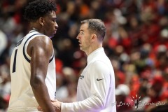 March 15, 2024: Utah State Aggies forward Great Osobor (1) speaks with Utah State Aggies head coach Danny Sprinkle during the second half of the Men’s Semifinals of the Mountain West Conference tournament, Friday, March 15, 2024, in Las Vegas, NV. Christopher Trim/A Lot of Sports Talk.