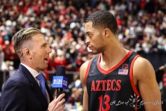 March 15, 2024: CBS reporter Evan Washburn speak with CBS reporter Evan Washburn during the second half of the Men’s Semifinals of the Mountain West Conference tournament, Friday, March 15, 2024, in Las Vegas, NV. Christopher Trim/A Lot of Sports Talk.