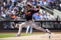 NEW YORK — AUGUST 21: Baltimore Orioles pitcher Cole Irvin (19) delivers a pitch during the first inning at Citi Field on August 21, 2024, in New York, New York. (Gregory Fisher/A Lot of Sports Talk)