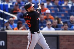 NEW YORK — AUGUST 21: Baltimore Orioles left fielder Austin Slater (15) hits a two run home run against the New York Mets during the sixth inning at Citi Field on August 21, 2024, in New York, New York. (Gregory Fisher/A Lot of Sports Talk)