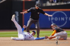 NEW YORK — AUGUST 21:  Baltimore Orioles shortstop Gunnar Henderson (2) steals second base ahead of the tag by New York Mets second baseman Jose Iglesias (11) during the seventh inning at Citi Field on August 21, 2024, in New York, New York. (Gregory Fisher/A Lot of Sports Talk)