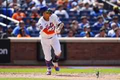 NEW YORK — AUGUST 21: New York Mets third baseman Mark Vientos (27) watches his home run against the Baltimore Orioles during the seventh inning at Citi Field on August 21, 2024, in New York, New York. (Gregory Fisher/A Lot of Sports Talk)