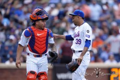 NEW YORK — AUGUST 21: New York Mets pitcher Adrian Houser (35) and New York Mets catcher Francisco Alvarez (4) react after getting the final out during the top of the ninth inning at Citi Field on August 21, 2024, in New York, New York. (Gregory Fisher/A Lot of Sports Talk)