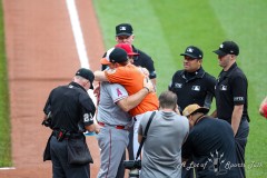 Baltimore, MD - July 9, 2022: Los Angeles Angels interim manager Phil Nevin (88) and Baltimore Orioles third baseman Tyler Nevin (41) hug before the game between the Baltimore Orioles and Los Angeles Angels at  Oriole Park at Camden Yards in Baltimore, MD.   (Photo by Elliott Brown/A Lot of Sports Talk)