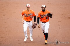 Baltimore, MD - July 9, 2022: Baltimore Orioles third baseman Ramon Urias (29) and Baltimore Orioles second baseman Rougned Odor (12) go to the dugout after turning a double play during the game between the Baltimore Orioles and Los Angeles Angels at  Oriole Park at Camden Yards in Baltimore, MD.   (Photo by Elliott Brown/A Lot of Sports Talk)